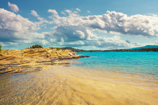 Seascape on a sunny day. Rocky beach