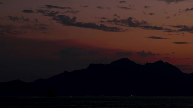 Timelapse night view World Heritage Miyajima fading into the pink sunset,4K