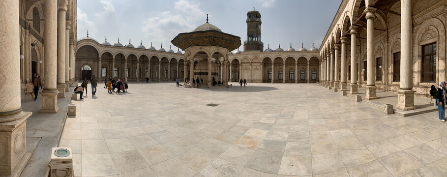 View of the courtyard of the Mosque of Muhammad Ali with its central ablution fountain, marble columns, and arched porticos in Cairo, Cairo Governorate, Egypt.