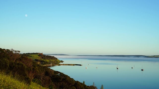 Low-lying fog drifting across calm waters at Beatrice Point, Kingscote, Kangaroo Island