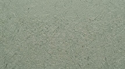 Fototapeta premium Macro close up of sage green textured paper surface with natural fibers