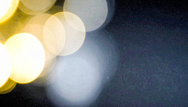 Abstract vintage pink orange red bokeh light circles on solid black background, soft glowing orbs texture, photorealistic defocused overlay effect Generative AI