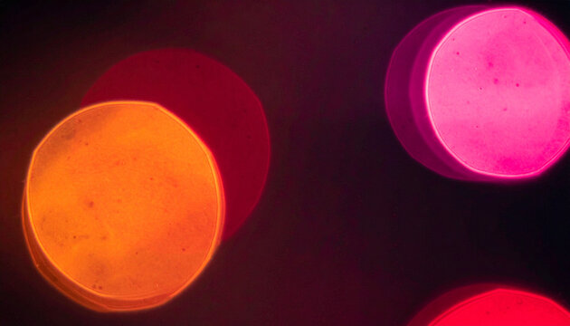 Pink orange red bokeh orbs black background Generative AI

