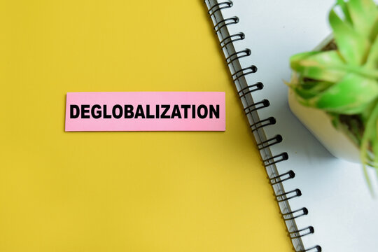 Concept of deglobalization write on sticky notes isolated on table. For world economy shift and trade policy