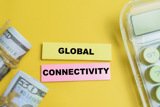 Concept of global connectivity write on sticky notes isolated on table. For international trade, finance and economy