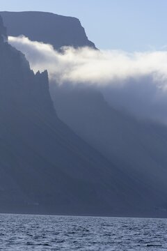 Pointed rocks and fog cloud, Isafj&ouml;rdur, Vestfir&eth;ir, Iceland