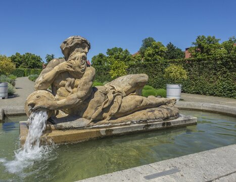 Fountain figure near flower garden, Kroměř&iacute;ž, Zl&iacute;nsk&yacute; kraj, Czech Republic