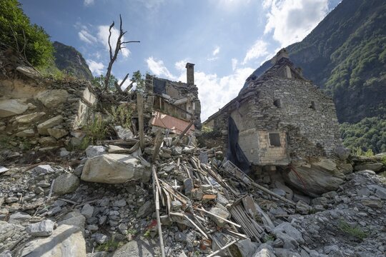 Devastation of a house due to debris and boulders, as a result of heavy rock and debris flow on the night of June 29-30, 2024 following heavy rains, Fontana, Bavona Valley or Val Bavona, Maggia Valley, Tessin, Switzerland
