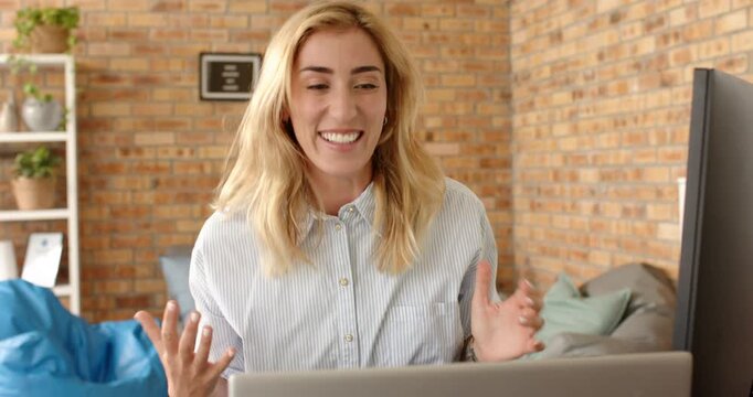 Lifestyle videos indoor of people doing activities at office, smiling woman using laptop and gesturi