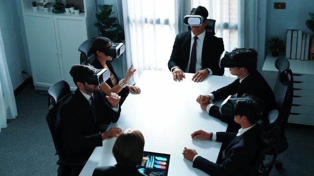 Top view of project manager working on laptop and sending data analysis to business people by using VR glass headset. Professional marketing team enter metadata or virtual world program. Directorate.