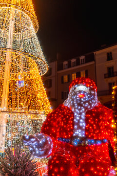 Santa claus light decoration in christmas city square