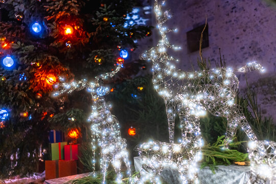 Reindeer light decorations glowing brightly celebrating christmas holiday