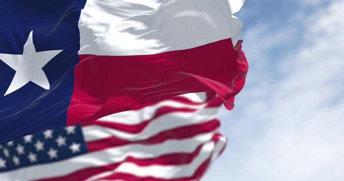 Texas and American flags waving together in blue sky. 3D render