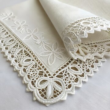 Elegant white vintage lace handkerchief with intricate embroidery detail