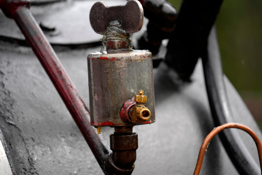 Vintage Steam Engine Valve and Brass Fitting Close-Up