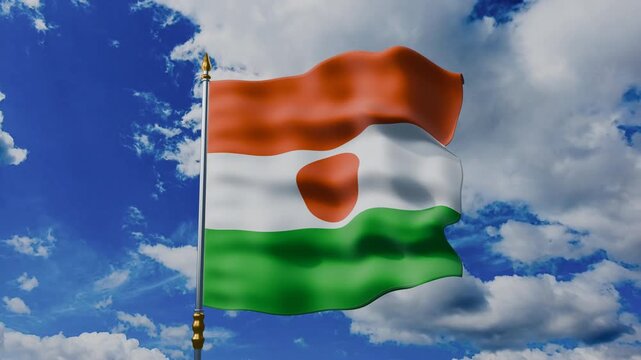 Niger Flag Waving Against Blue Sky