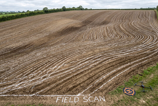 Serene farmland scan with drone survey and mapping lines