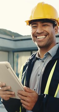 Construction worker, face and happy man with tablet, outdoor and laugh with research for renovation. Safety coordinator, portrait and person with smile, scroll and site inspection with technology
