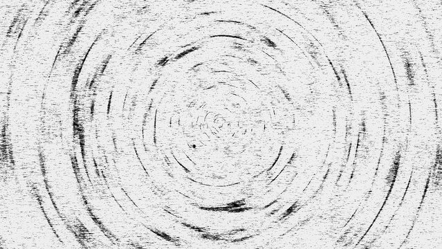 Abstract circular scratch texture in black and white. Grunge concentric ring pattern background.