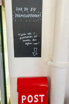 Stockholm, Sweden  A sign at the Kladdkaka cafe on Sodermalm asks for recipe suggestions on favourite cakes in Swedish.