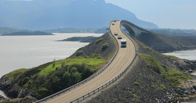Vevang, Norway - June 20,2023: Traffic on Atlantic Ocean Road or the Atlantic Road (Atlanterhavsveien) was awarded the title as (Norwegian Construction of the Century).
