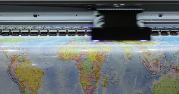 Modern Digital Large format UV printer. Printing production technologies. UV pinning is the process of applying a dose of low intensity ultraviolet light to a UV curable ink