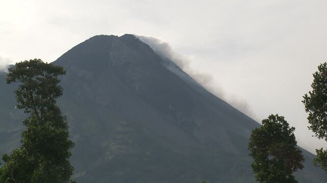Volcanic Gas And Steam Rise From Merapi Volcano In Indonesia