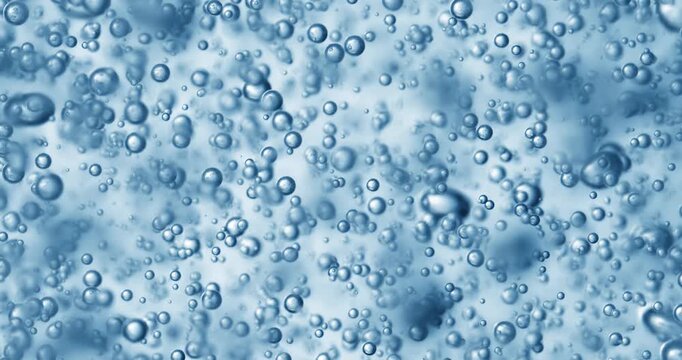 Abstract blue water bubbles background with floating air spheres.