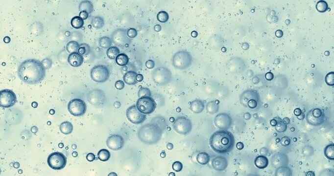 Abstract blue water bubbles background with floating air spheres.