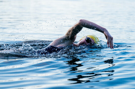 White swimmer performing freestyle stroke