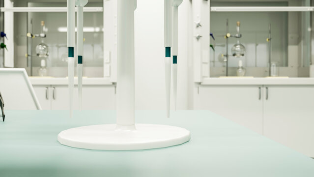Laboratory pipettes with plastic tips on bench in research lab