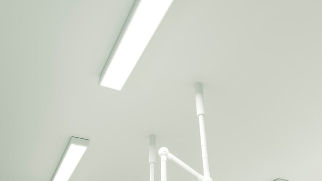 Fluorescent lights and surgical light arms on medical ceiling