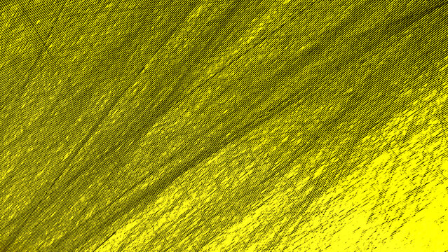 Yellow paint brush strokes creating textured abstract surface