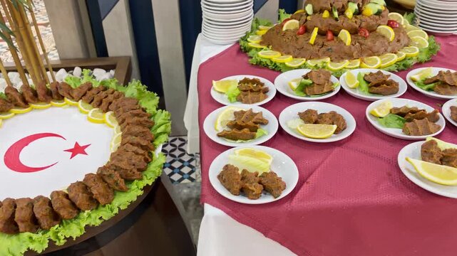 Traditional Turkish Cig Kofte Buffet Display with Lemons and Turkish Flag