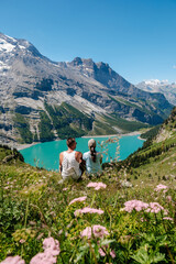 Fototapeta premium Majestic Oeschinensee lake view surrounded by lush mountains in Switzerland