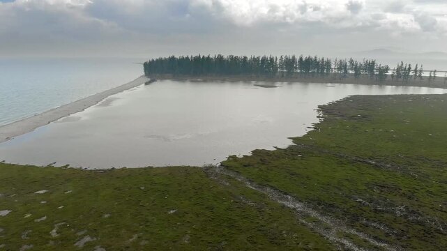 Lake Baikal coastal lagoons show stone barrier formation along a changing freshwater shoreline.