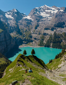 Majestic view of Oeschinensee in Switzerland surrounded by towering mountains