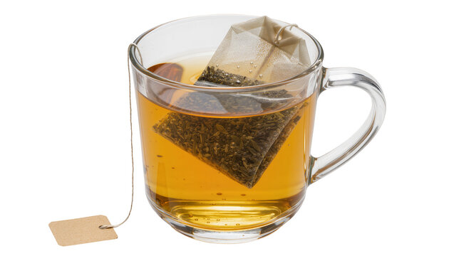 Glass mug with amber tea and pyramid tea bag, isolated on transparent background