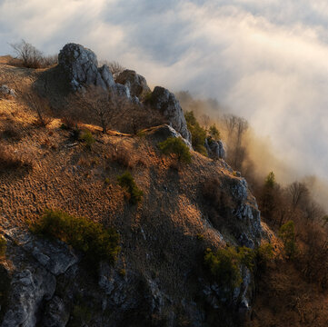 Colorfull sunset behind Mountain peak landscape above clouds