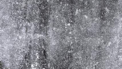 Obraz premium Light monochrome concrete texture with fine rough grain, subtle weathering, uneven surface, and natural industrial background details.
