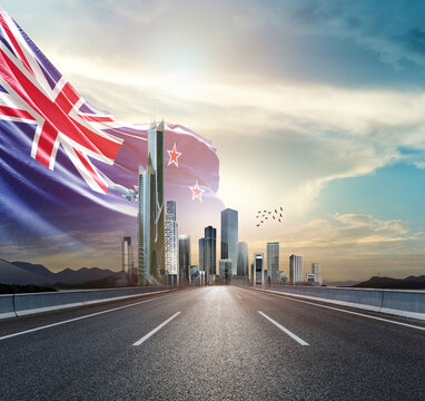 New Zealand national flag waving behind the cityscape. New Zealand national flag for independence day.