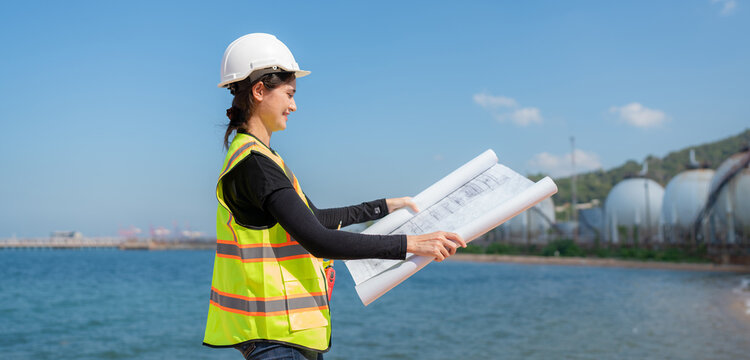 Woman engineer working and inspection gas pipeline system new construction project of industrial.