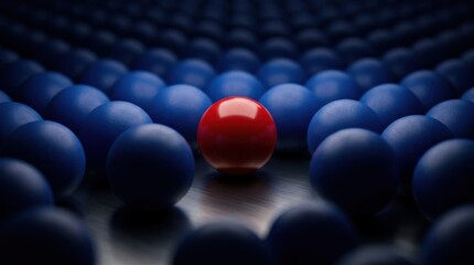 Fototapeta premium Single bright red sphere standing out among a dense field of dark cobalt-blue spheres, leadership and individuality conceptual 3D artwork, shallow perspective, dramatic low-key lighting, saturated