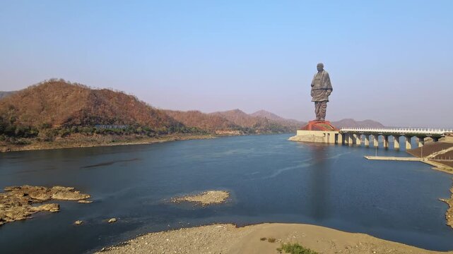 Aerial footage of the Statue of Unity, which stands at 182 meters, depicts the statue of Sardar Vallabhbhai Patel, India's first home minister, near the Narmada River.