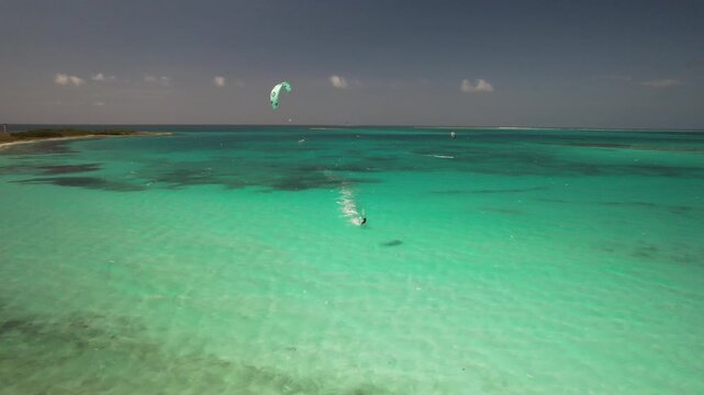 Aerial view of kitesurfer in Los Roques archipelago, Venezuela.