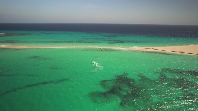 Aerial view of a kitesurfer in Los Roques, Venezuela.