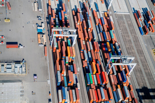 Shipping containers stacked at container yard in Long Beach port
