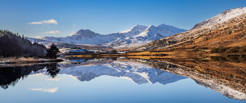Snow covered Mount Snowdon reflected in Llynnau Mymbyr,  Snowdonia National Park, Gwynedd, North Wales
