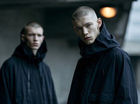 Young Men Wearing Modern Urban Streetwear Jackets