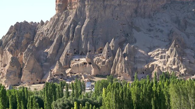 Aerial views sweep across Cappadocia fairy chimneys, valleys, and eroded tuff landscapes.